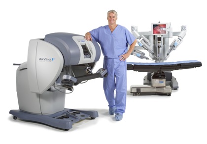 A healthcare professional with the da Vinci Surgical System equipment