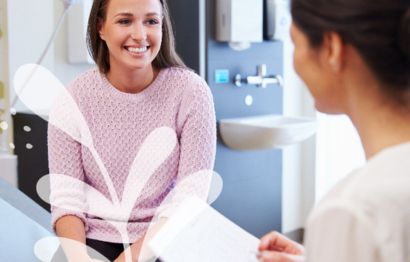 A female patient in a doctor's clinic room.